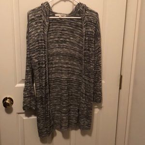 Black and white long sweater with hood